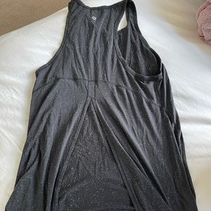 Black spotted white lululemon race back with tie back tank top.